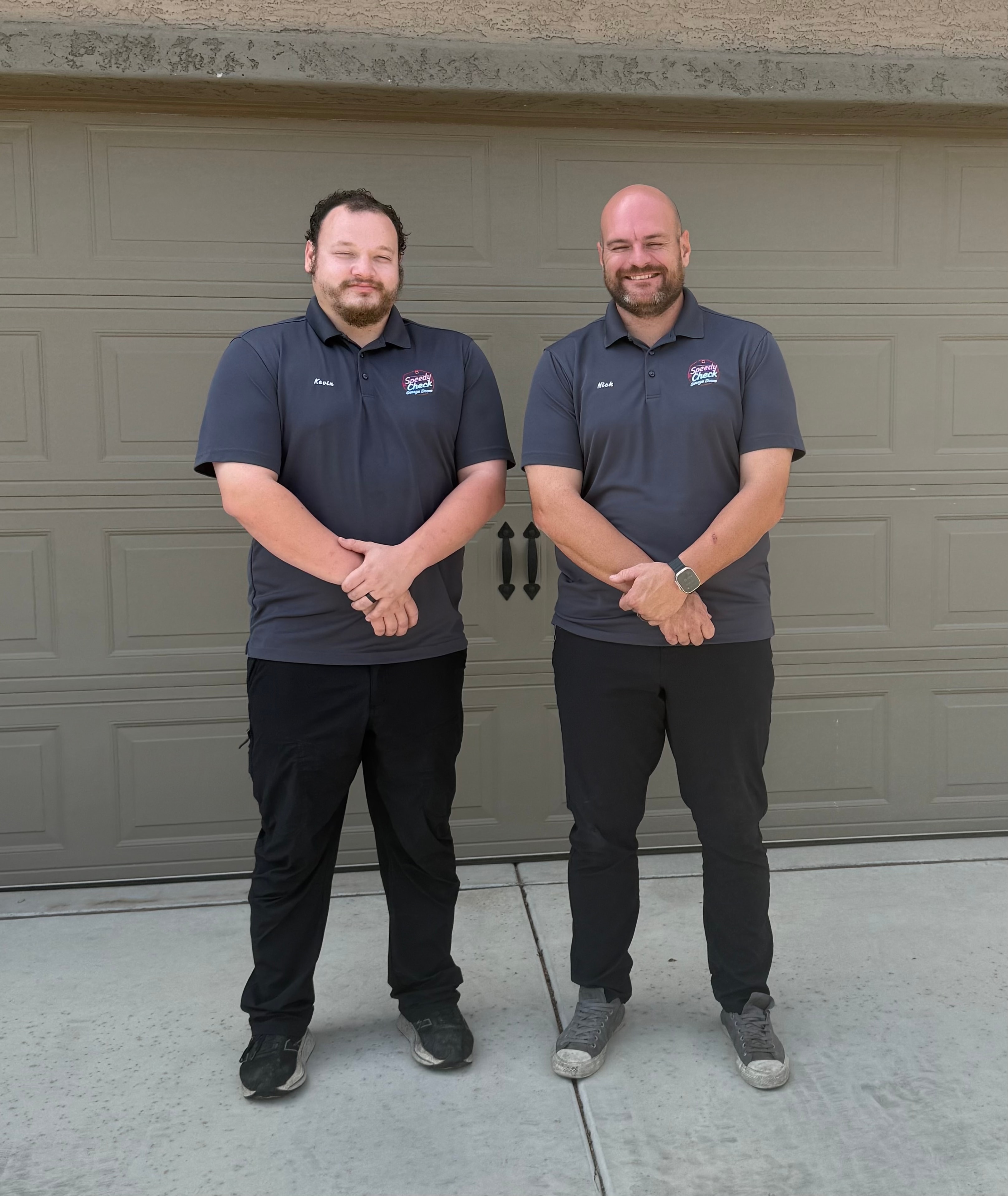 Speedy Check Garage Doors technicians in the shop